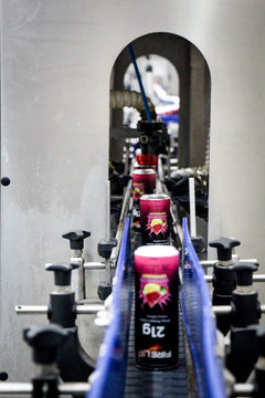 Fire Up cans on the canning line