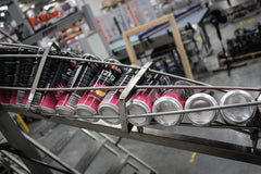 Fire Up cans on the conveyor during the second production run